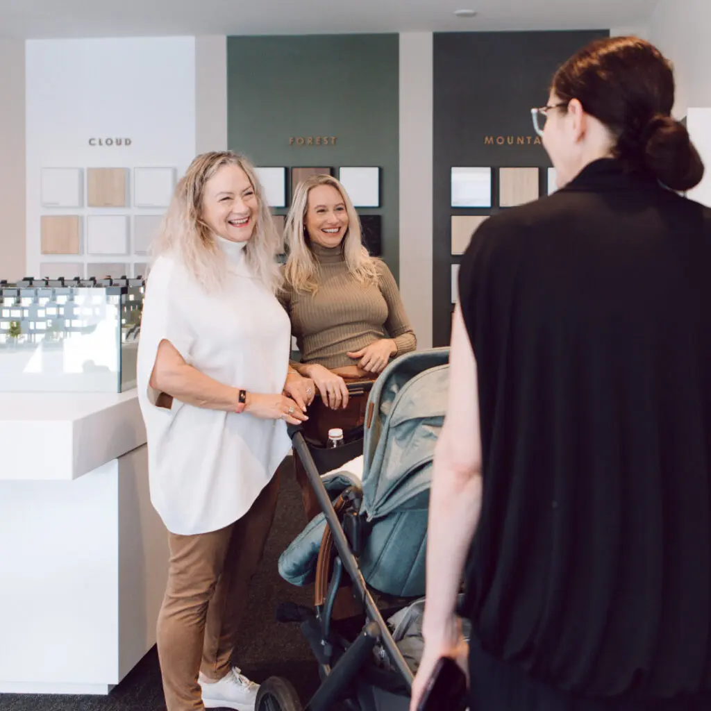 A family looking at the options at the Morrison Walk Pesentation Centre